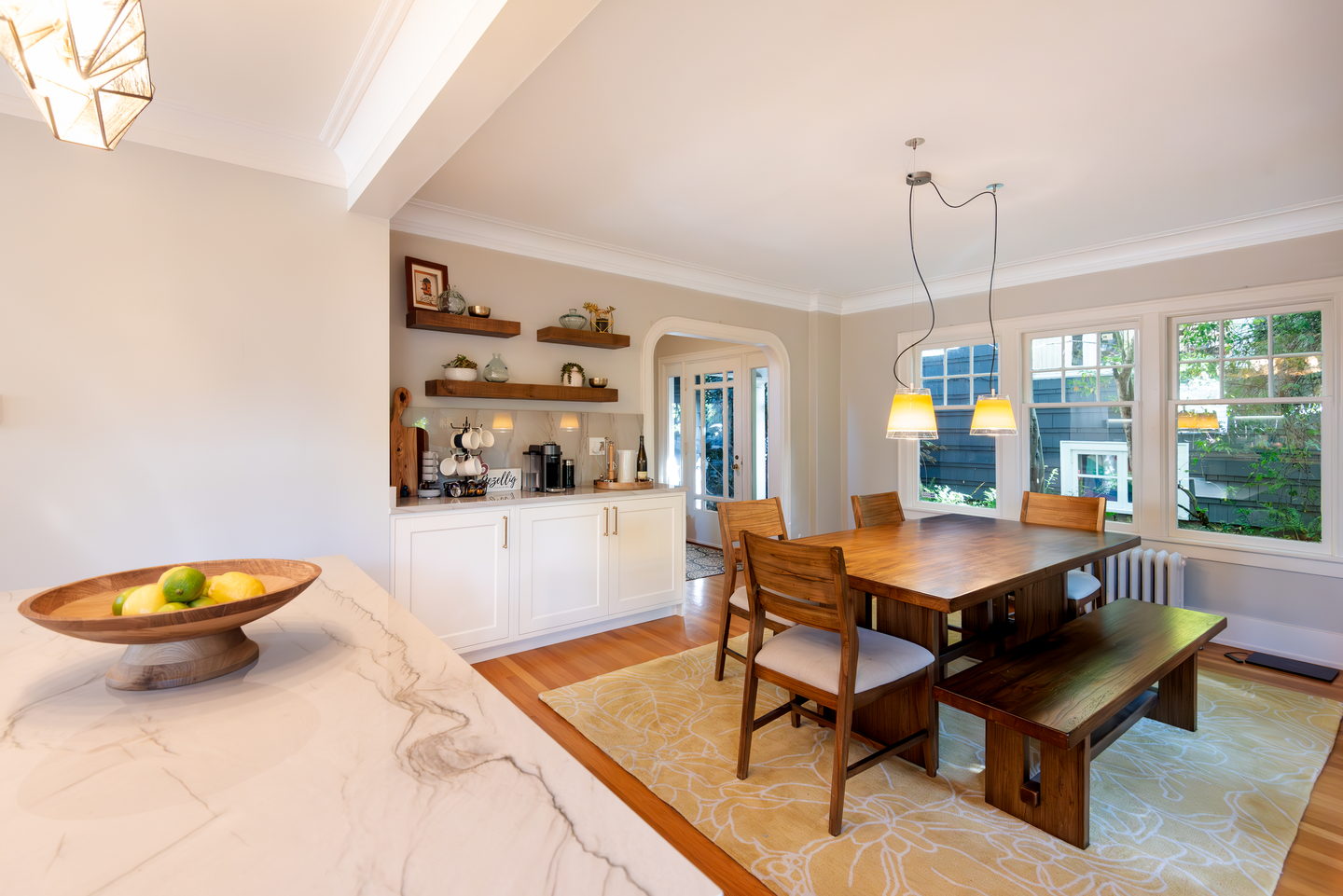 A First Hill kitchen in white with marble counters