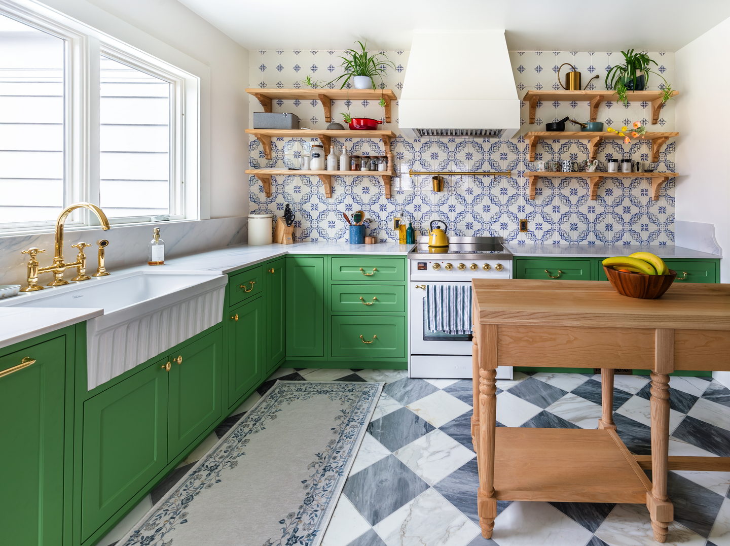 The same kitchen from the other end, with the checkerboard floor running through